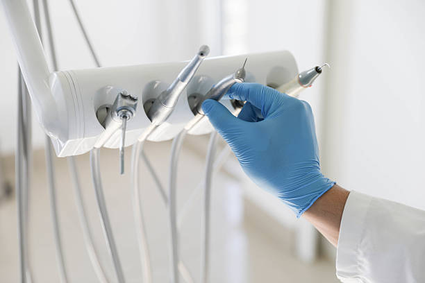 Professional Tooth Extraction technician working in Byron Center, MI